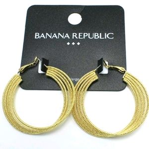 GOLD TONE TEXTURED TWISTED HOOP EARRINGS